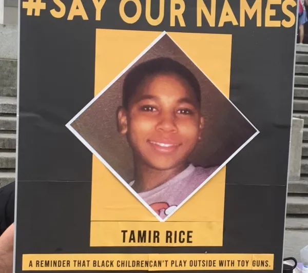A #Say Our Names protest sign: Tamir Rice, a reminder that black children can’t play outside with toy guns.
