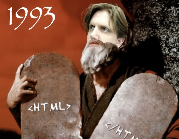 John Albin dressed as Moses bearing stone tablets saying “<html>” and “</html>”